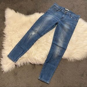 Light washed distressed skinny jeans